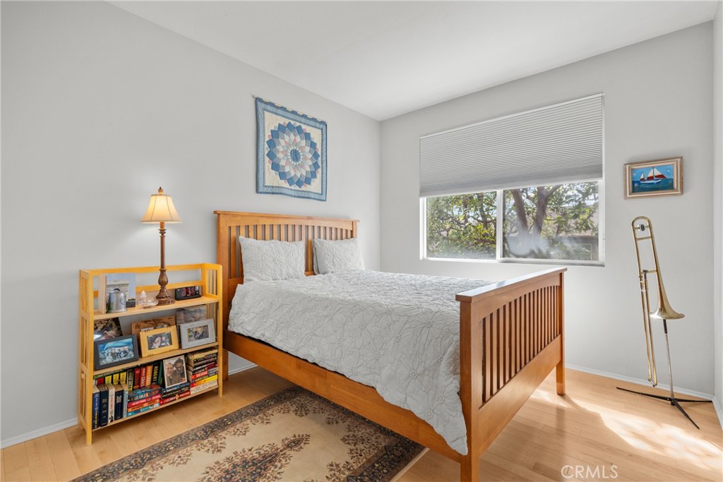 17823 Poplar Court Carson, CA 90746 - Photo 18 of 30 a bedroom with furniture and a window