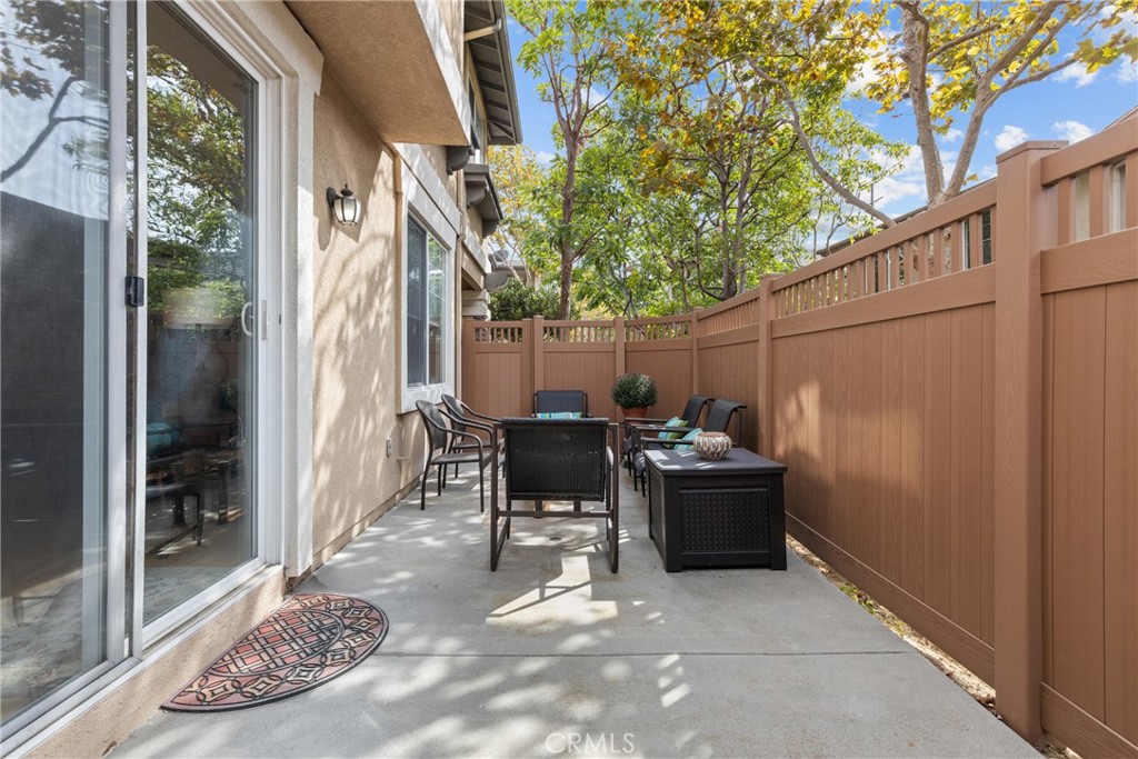 17823 Poplar Court Carson, CA 90746 - Photo 22 of 30 a view of a patio with table and chairs and potted plants