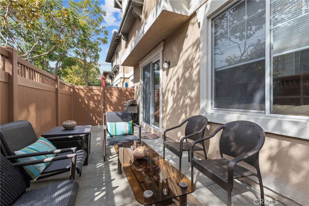 17823 Poplar Court Carson, CA 90746 - Photo 23 of 30 a backyard of a house with table and chairs