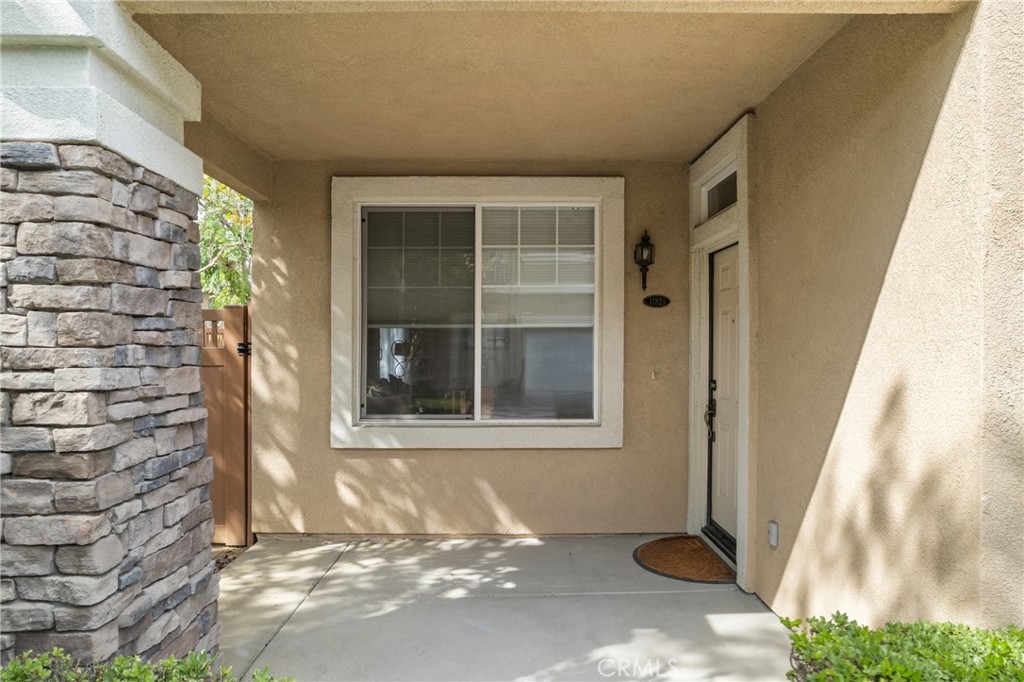17823 Poplar Court Carson, CA 90746 - Photo 5 of 30 a front view of a house with a yard