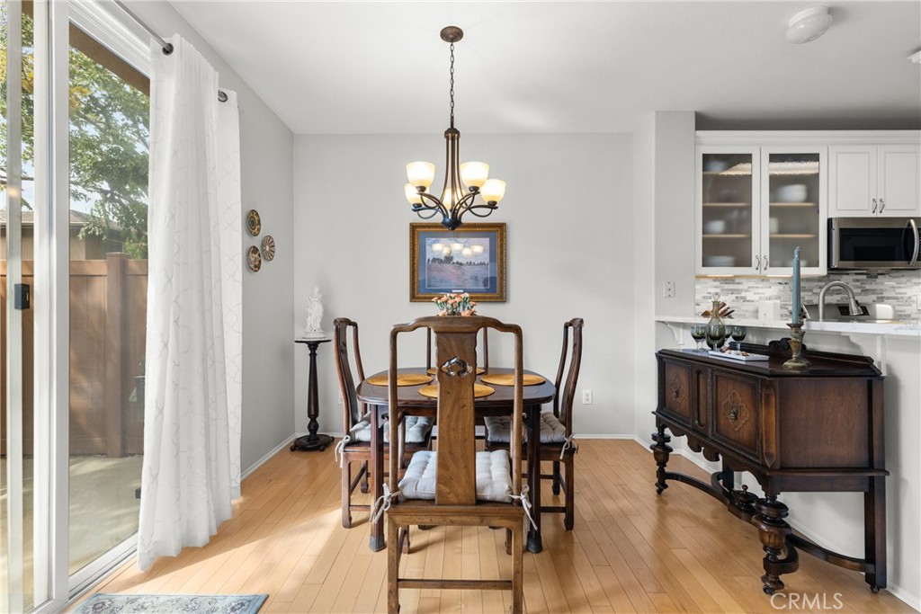17823 Poplar Court Carson, CA 90746 - Photo 10 of 30 a view of a dining room with furniture window and outside view