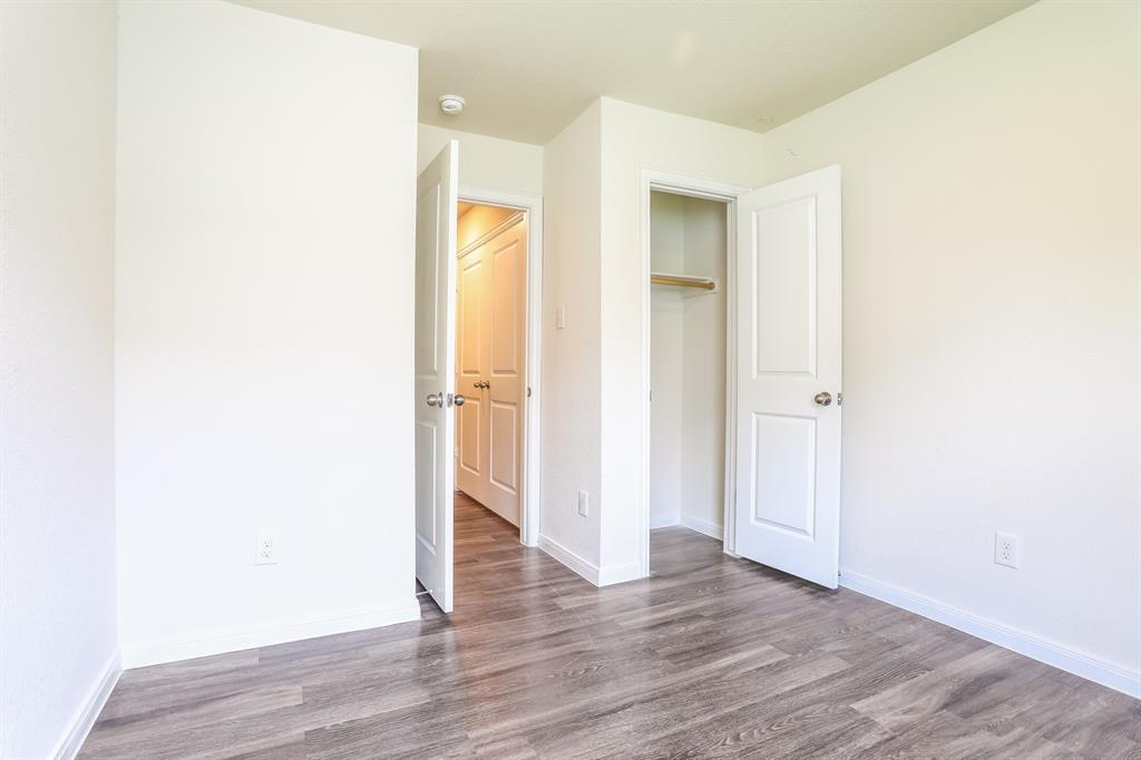2515 Lyle Avenue Waco, TX 76708 - Photo 15 of 21 a view of a hallway with wooden floor