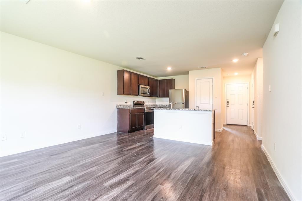 2515 Lyle Avenue Waco, TX 76708 - Photo 4 of 21 a view of kitchen with wooden floor