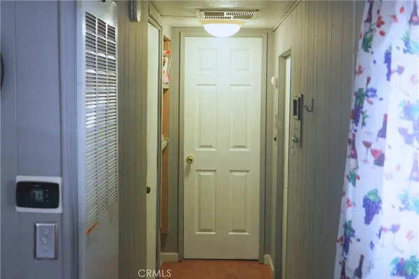 a bathroom with a shower and a sink