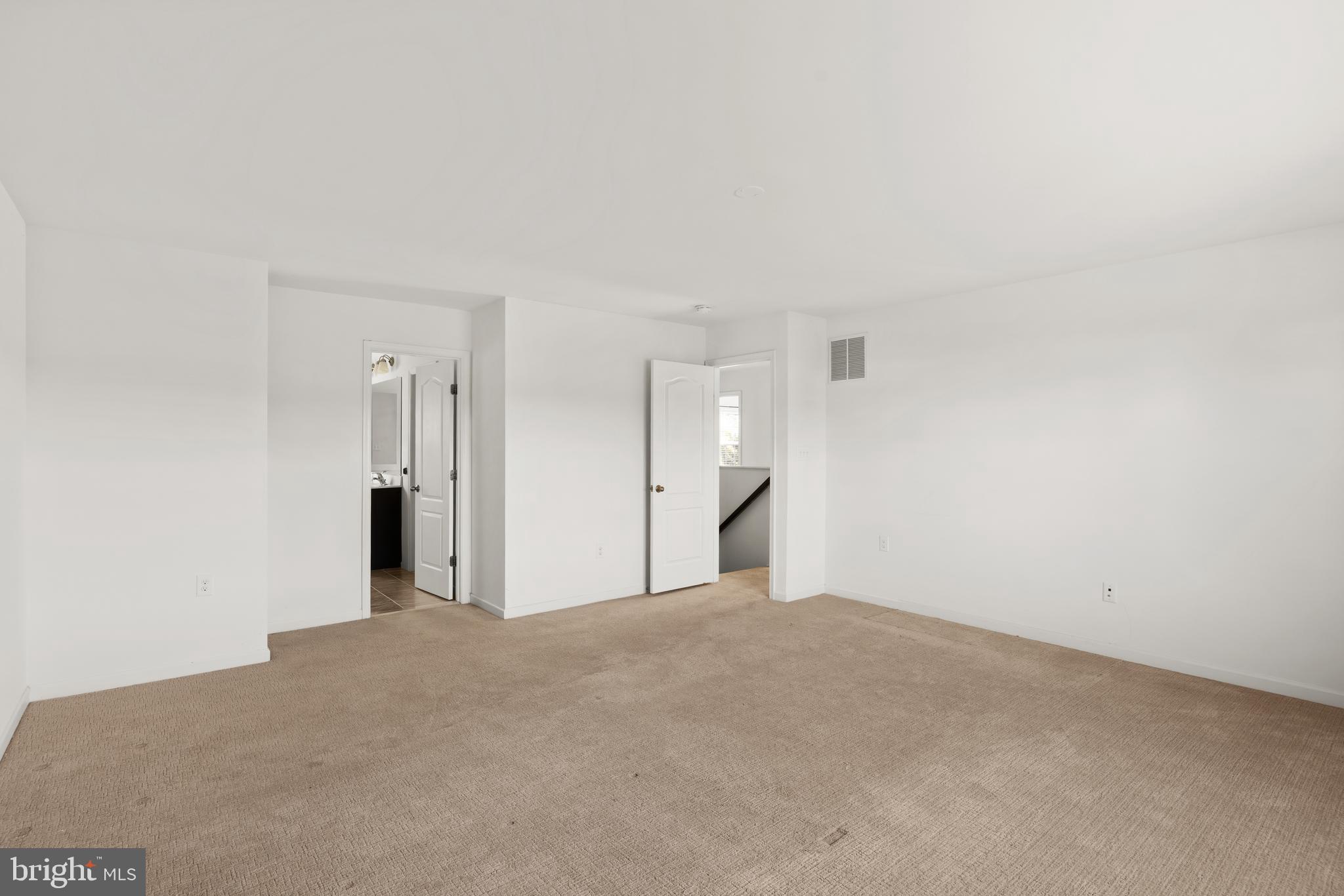 100 Taylor Court Stephenson, VA 22656 - Photo 14 of 36 a view of a big room with closet and chandelier fan