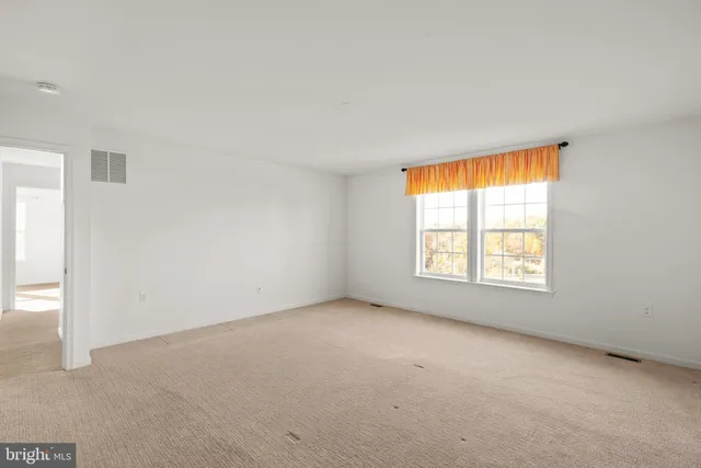 an empty room with a window