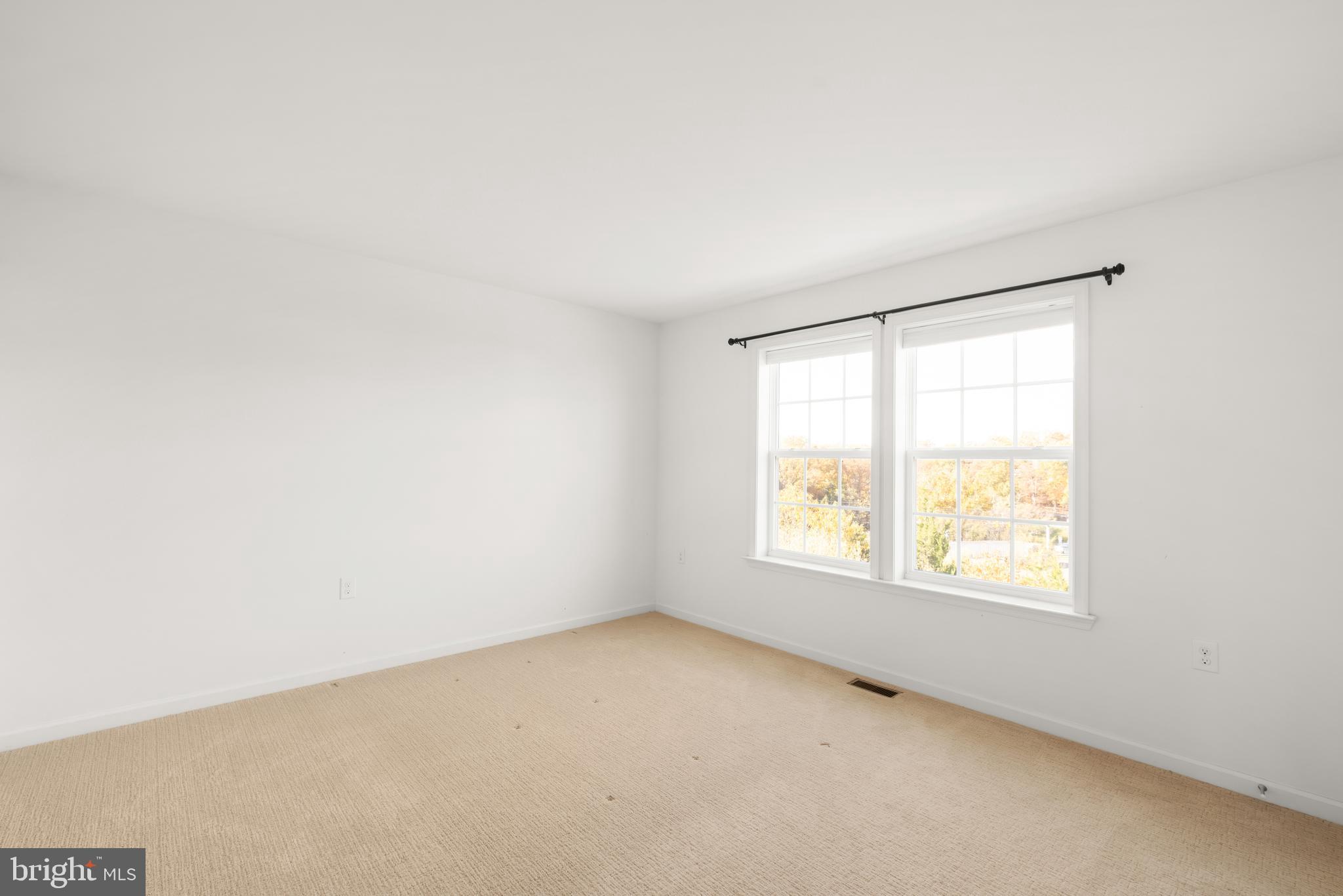 100 Taylor Court Stephenson, VA 22656 - Photo 20 of 36 an empty room with a window
