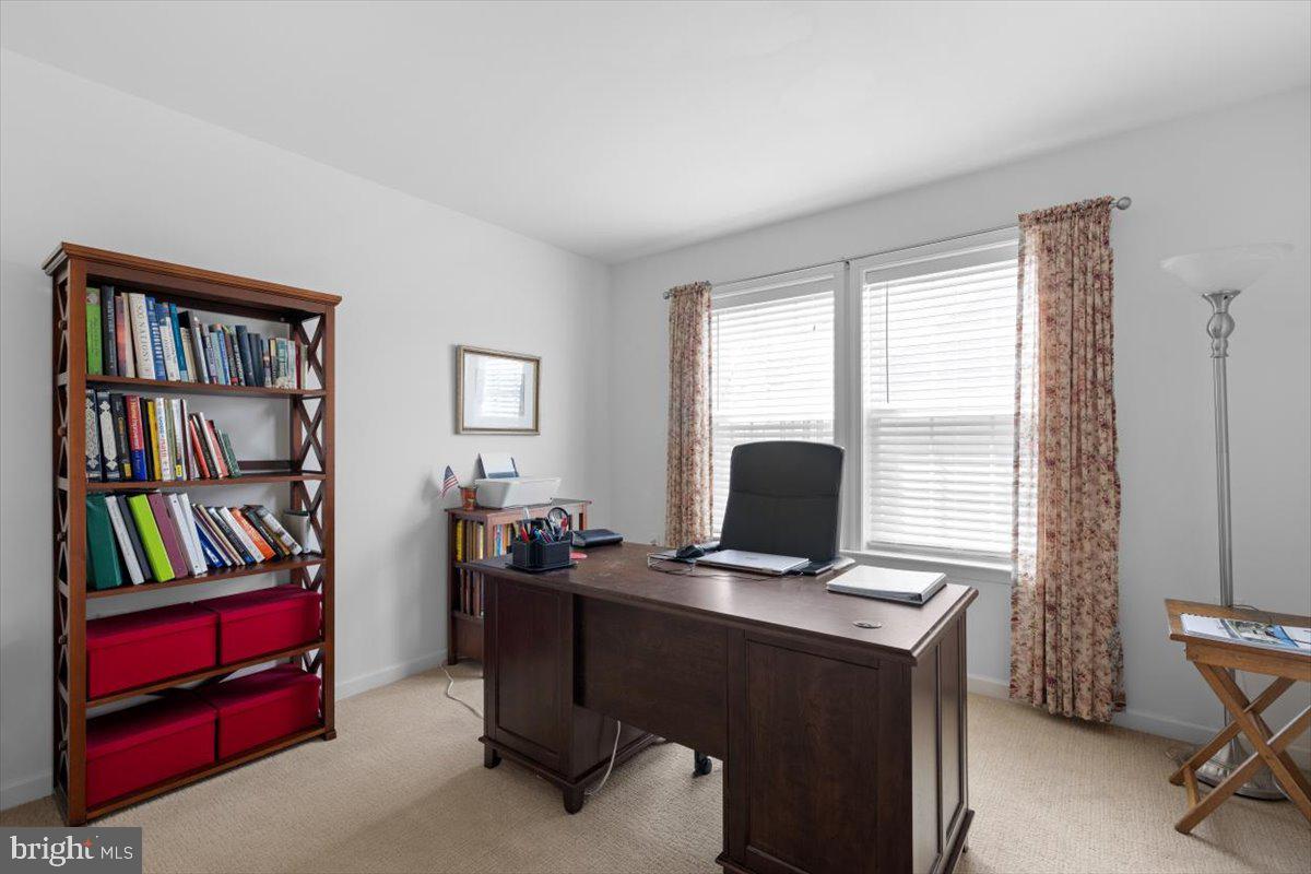 100 Taylor Court Stephenson, VA 22656 - Photo 22 of 36 a view of a workspace with a window and cabinet