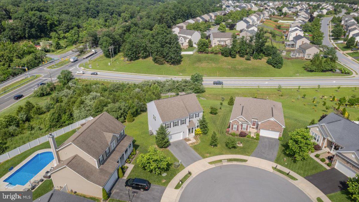100 Taylor Court Stephenson, VA 22656 - Photo 34 of 36 an aerial view of a house with a garden and lake view
