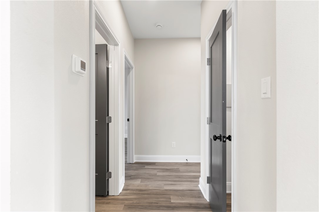 11001-11005 Breedlove Road College Station, TX 77845 - Photo 18 of 40 Corridor with light wood-style flooring