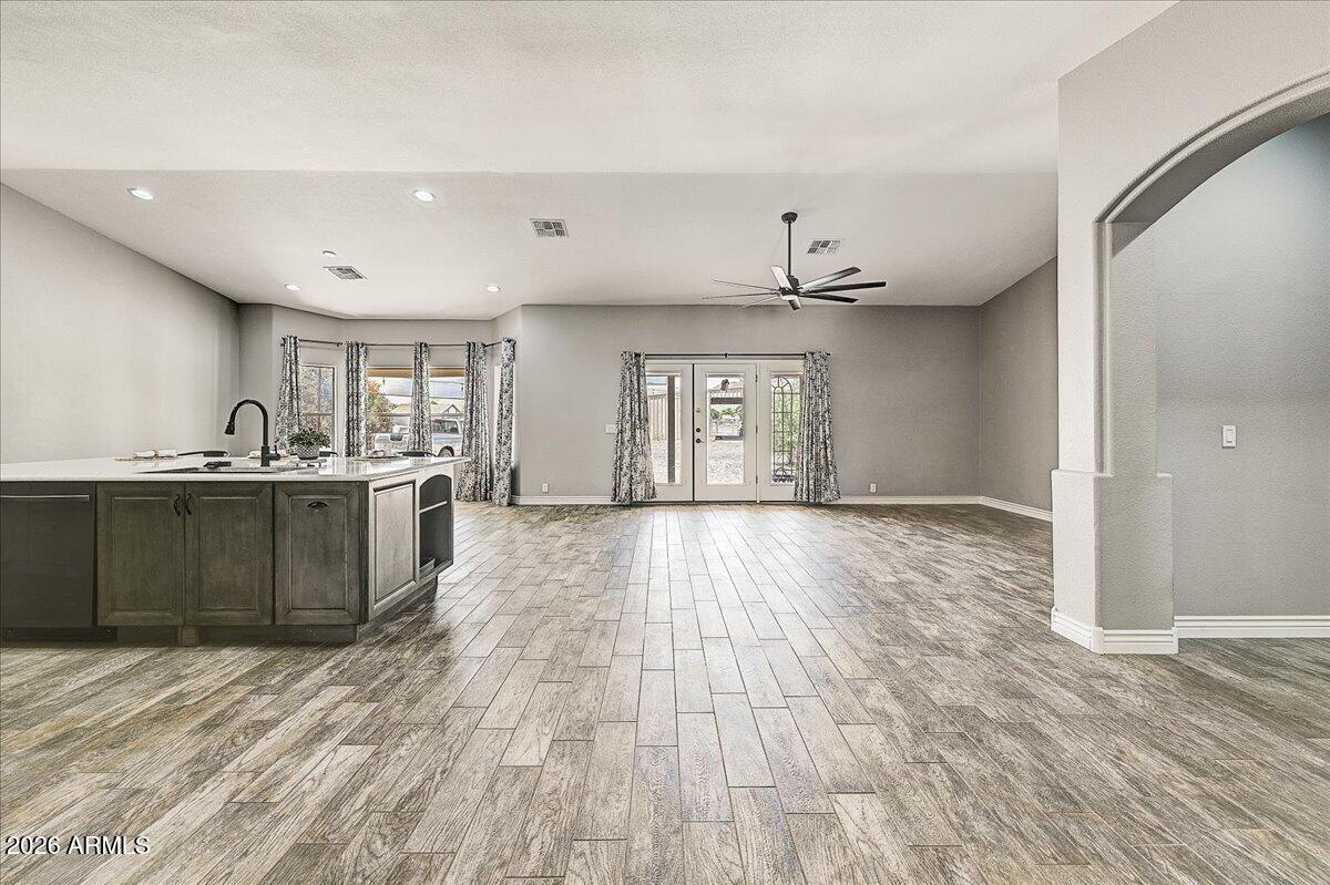 7624 North Citrus Road Waddell, AZ 85355 - Photo 8 of 57 a view of a kitchen with a sink and cabinets