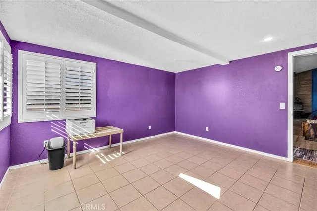 a bedroom with a bed and a closet