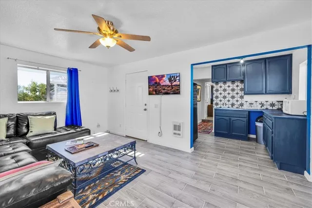 a view of a house with a snow in the yard