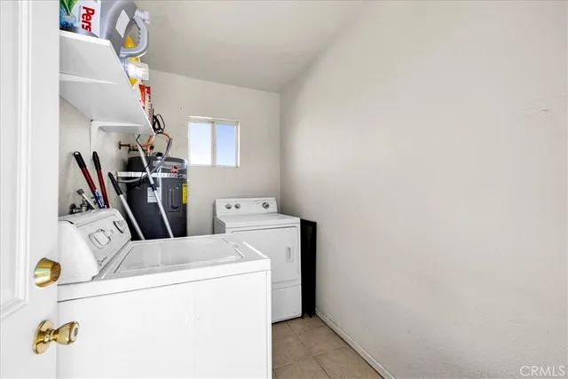 an aerial view of residential house and green space