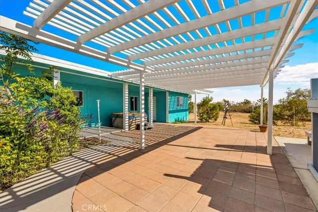 an aerial view of residential house and mountain view