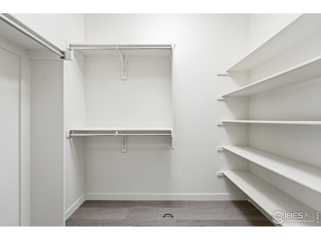 4501 Nelson Road, Unit 2404 Longmont, CO 80503 - Photo 15 of 23 a view of walk in closet with empty racks
