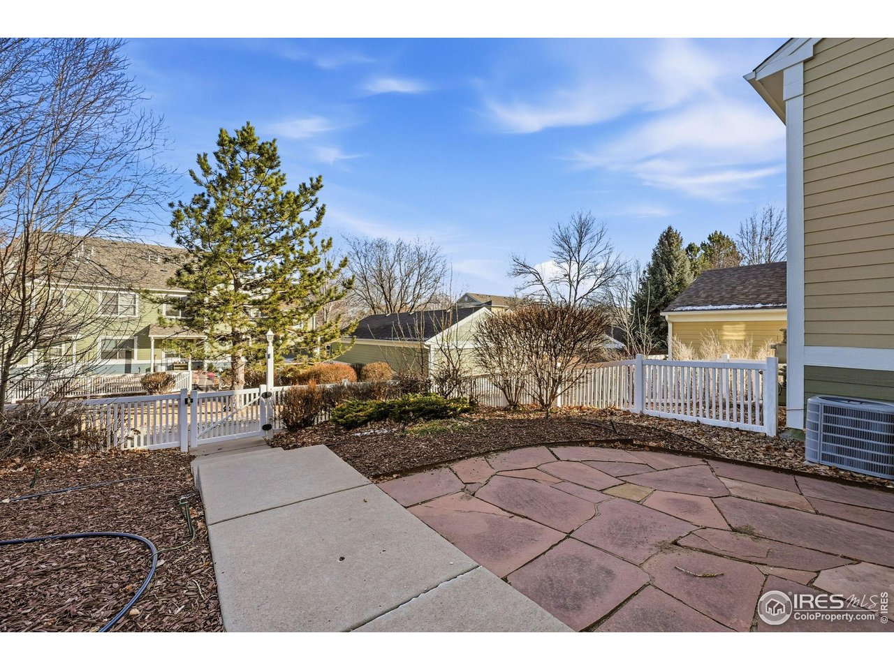 4501 Nelson Road, Unit 2404 Longmont, CO 80503 - Photo 21 of 23 a view of a backyard