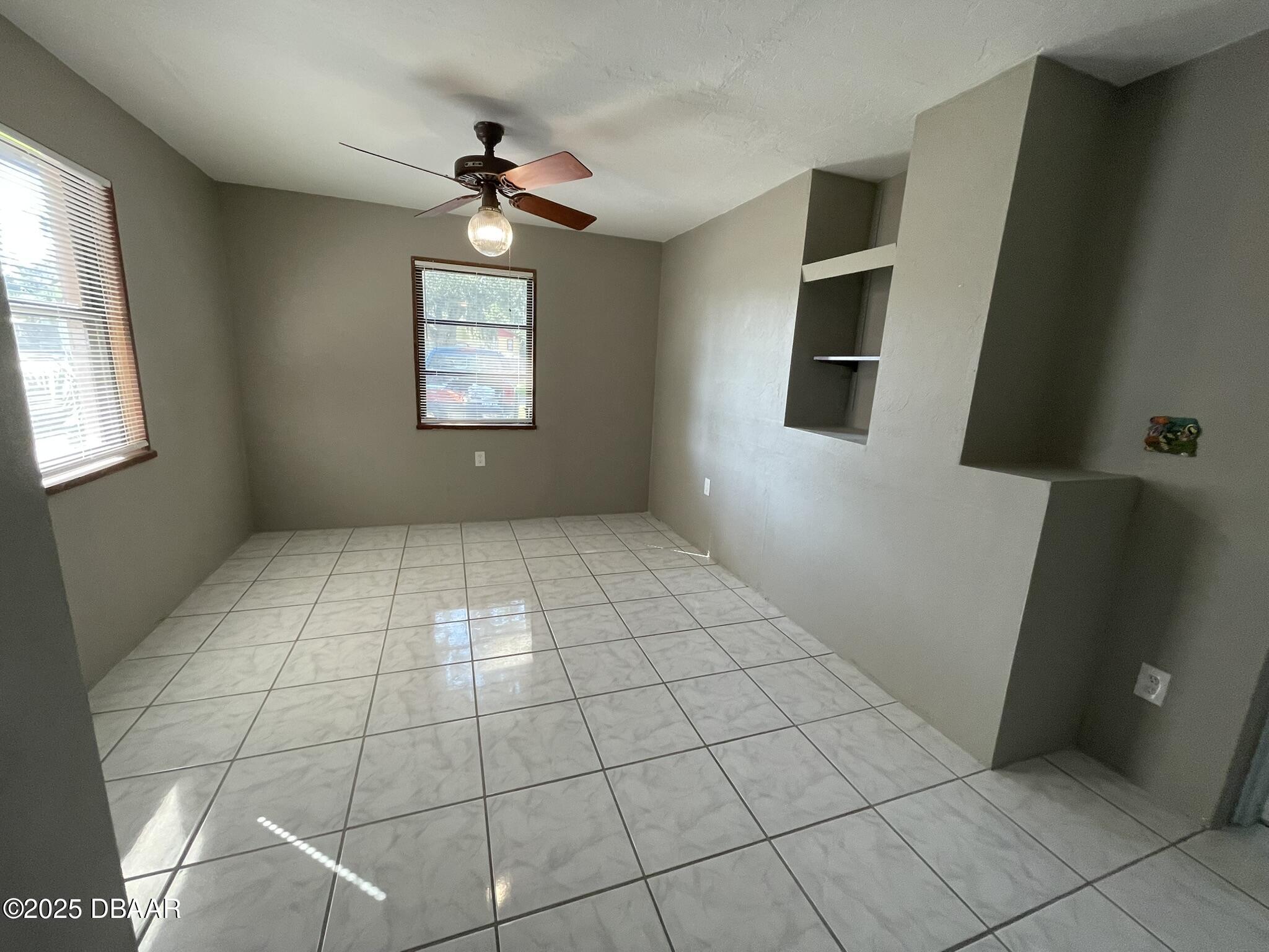 113 Fox Place Port Orange, FL 32127 - Photo 17 of 40 a view of an empty room with a window