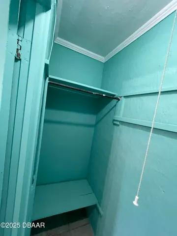 a bathroom with a shower and toilet
