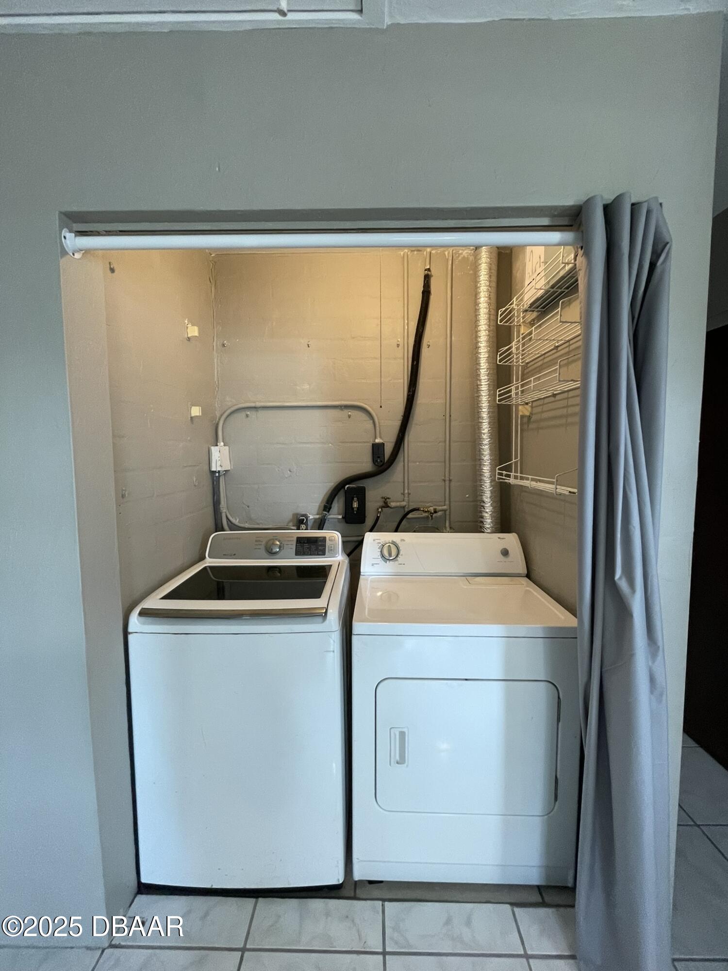 113 Fox Place Port Orange, FL 32127 - Photo 36 of 40 a utility room with dryer and washer