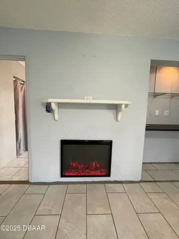 a living room with a fireplace