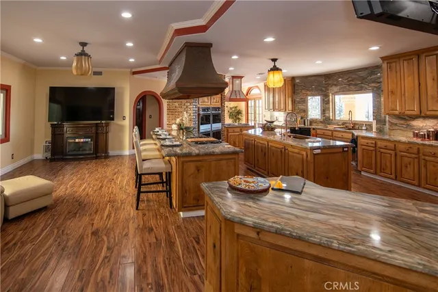 a kitchen with sink cabinets and appliances