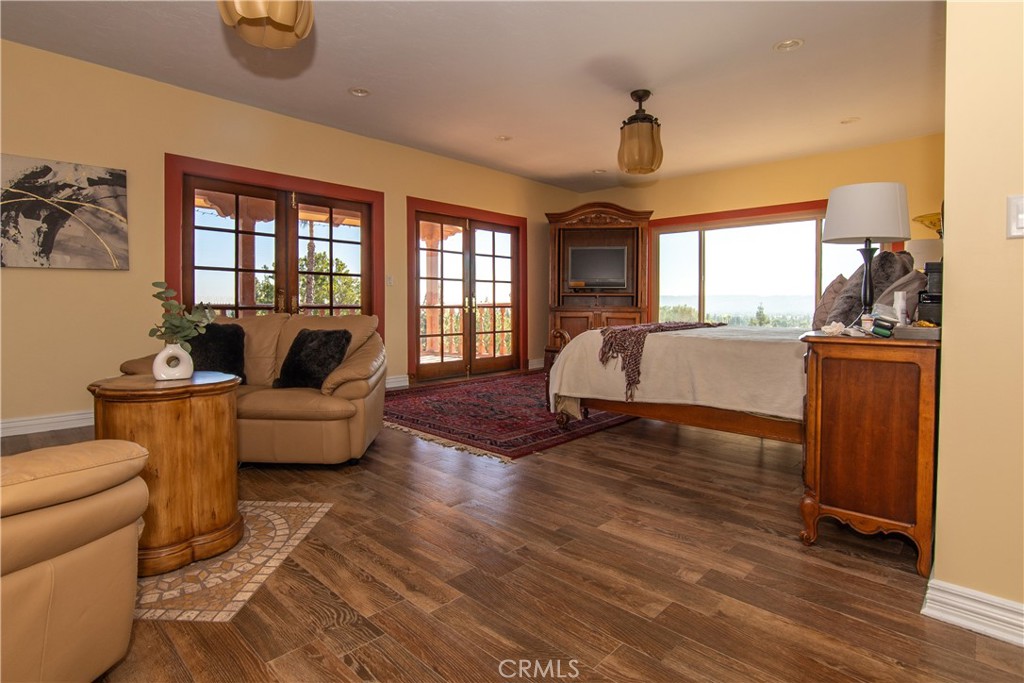 10425 Melvin Avenue Porter Ranch, CA 91326 - Photo 48 of 61 a living room with furniture and a large window