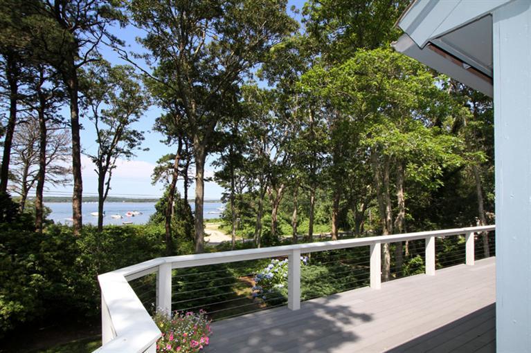 505 Scraggy Neck Road Cataumet, MA 02534 - Photo 2 of 33 a view of a balcony with outdoor space