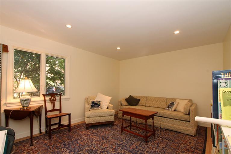 505 Scraggy Neck Road Cataumet, MA 02534 - Photo 24 of 33 a living room with furniture and a large window