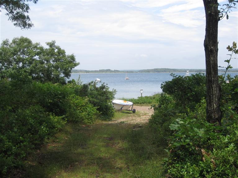 505 Scraggy Neck Road Cataumet, MA 02534 - Photo 27 of 33 a view of a lake with lots of trees