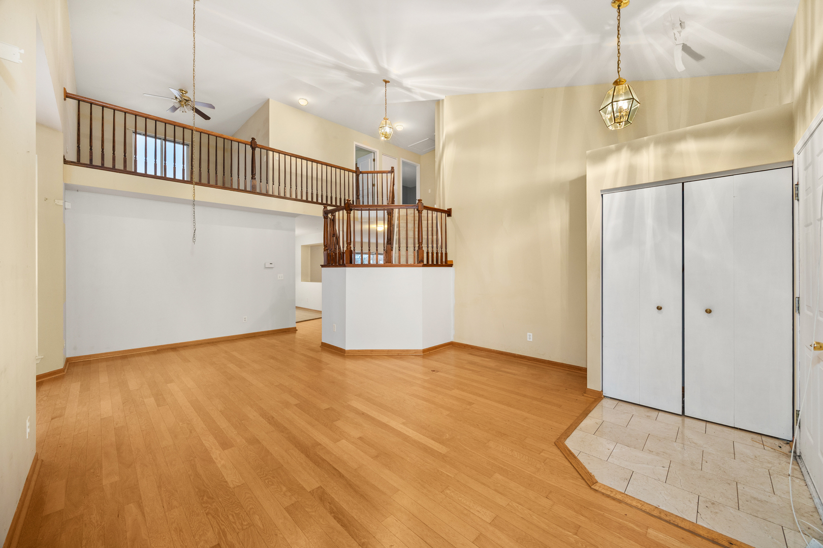 14252 South Hemingway Circle Plainfield, IL 60544 - Photo 12 of 36 a view of empty room with wooden floor