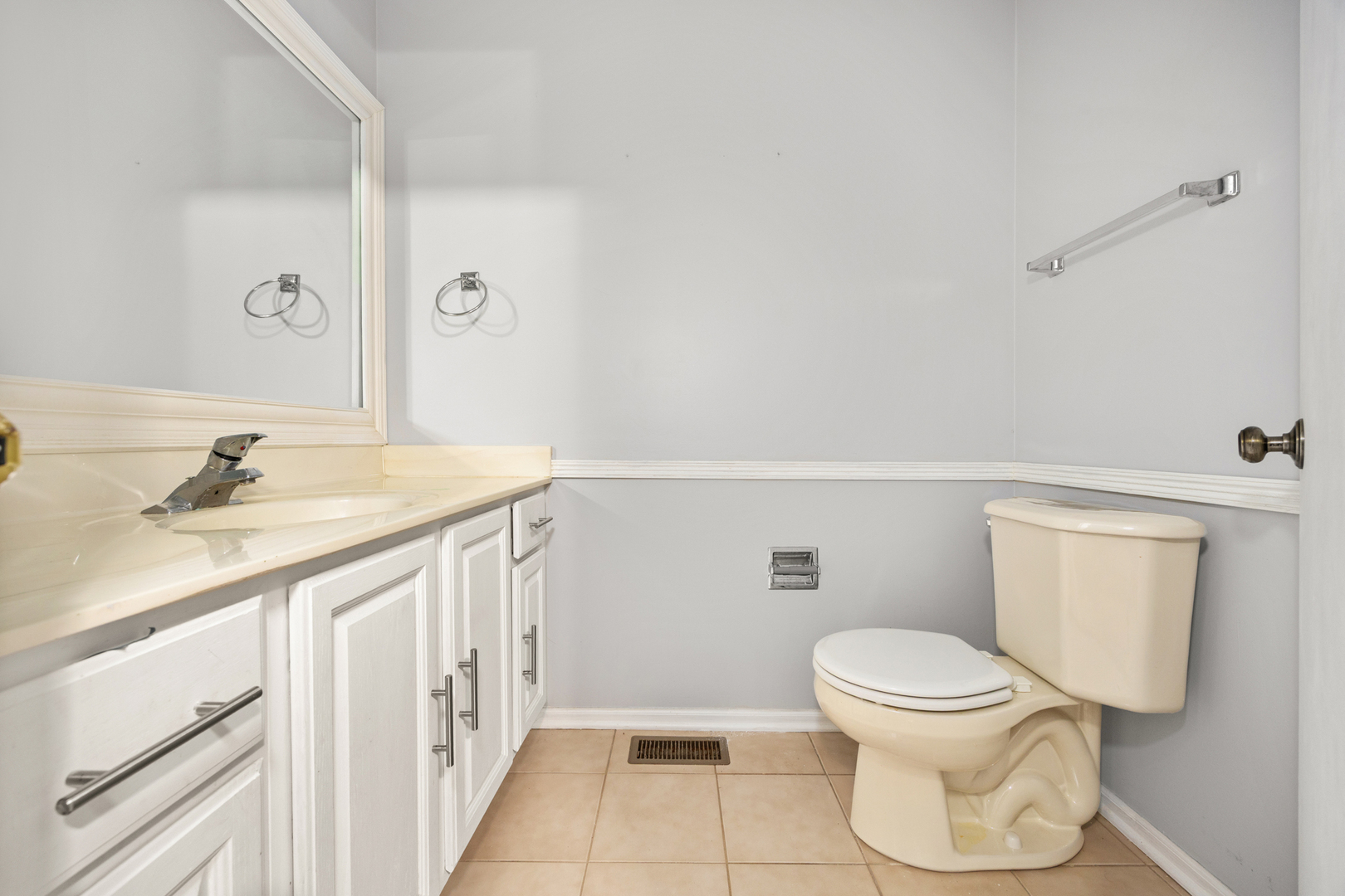 14252 South Hemingway Circle Plainfield, IL 60544 - Photo 29 of 36 a bathroom with a sink a toilet and a mirror