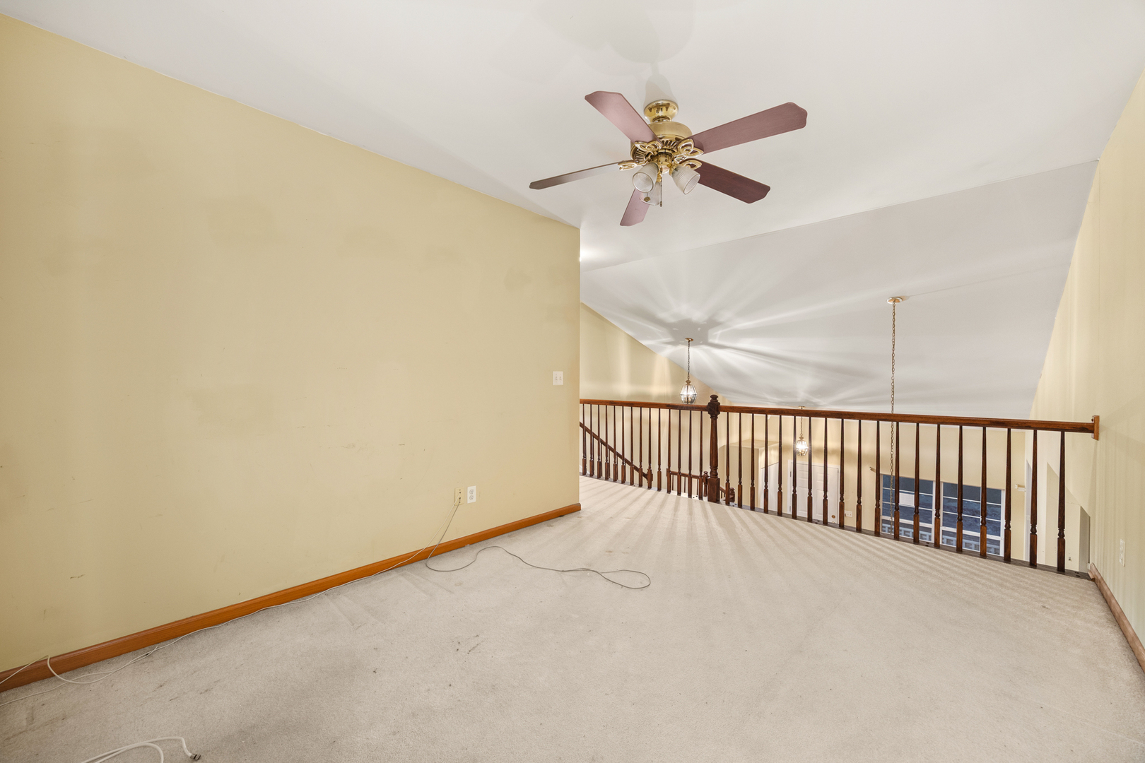 14252 South Hemingway Circle Plainfield, IL 60544 - Photo 33 of 36 a view of a room with a window and a ceiling fan