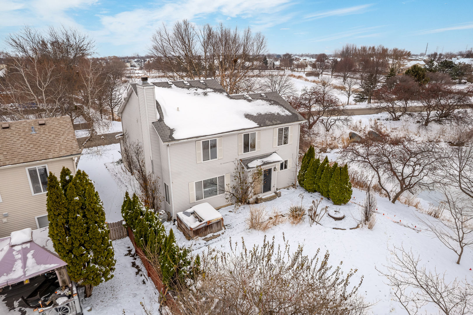 14252 South Hemingway Circle Plainfield, IL 60544 - Photo 7 of 36 a view of a house with a yard