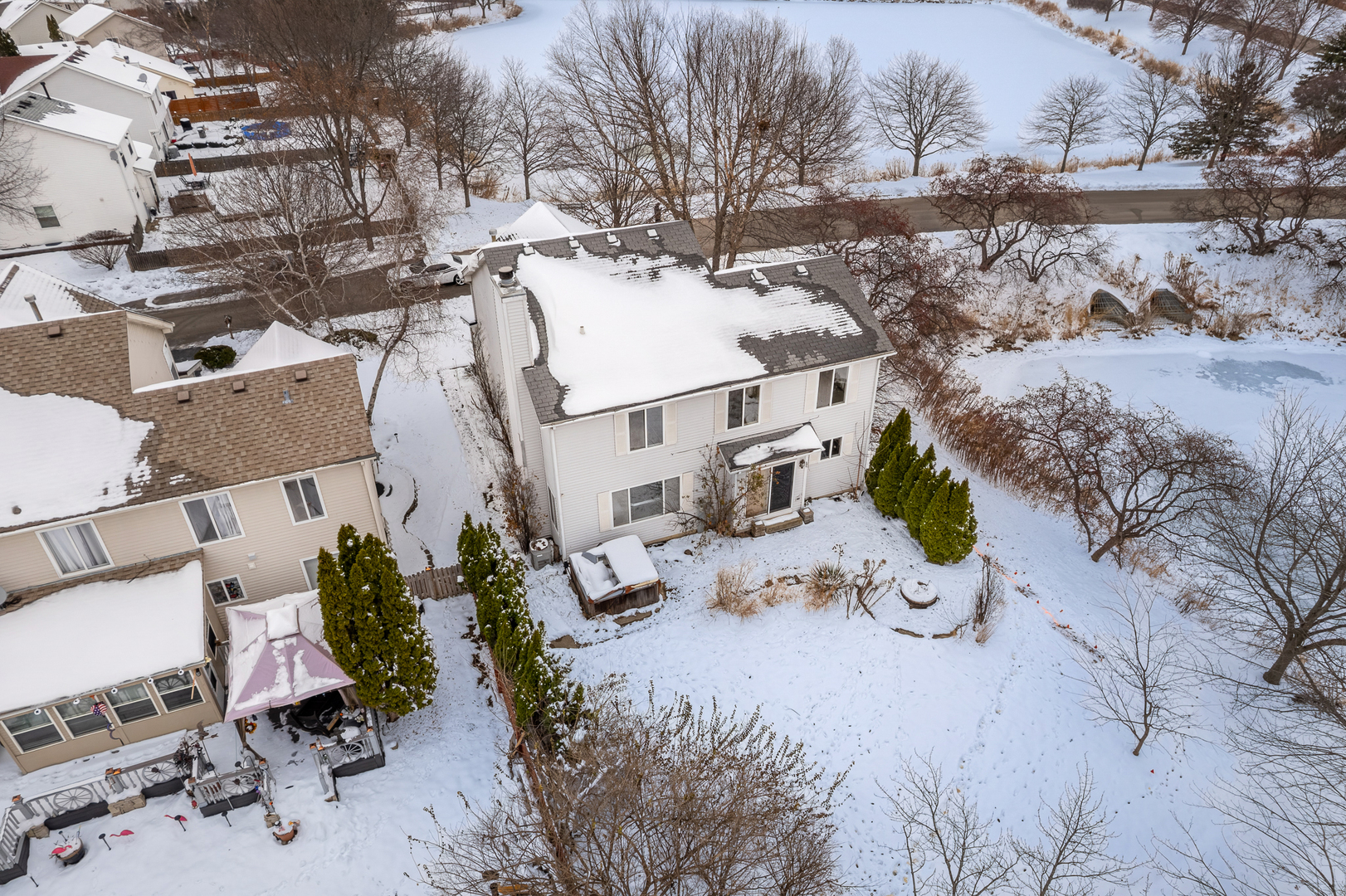 14252 South Hemingway Circle Plainfield, IL 60544 - Photo 8 of 36 a view of backyard of a house