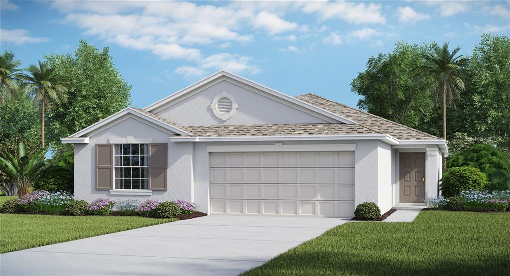 6620 Mineral Springs Road New Port Richey, FL 34653 - Photo 1 of 1 a front view of a house with a garden and plants