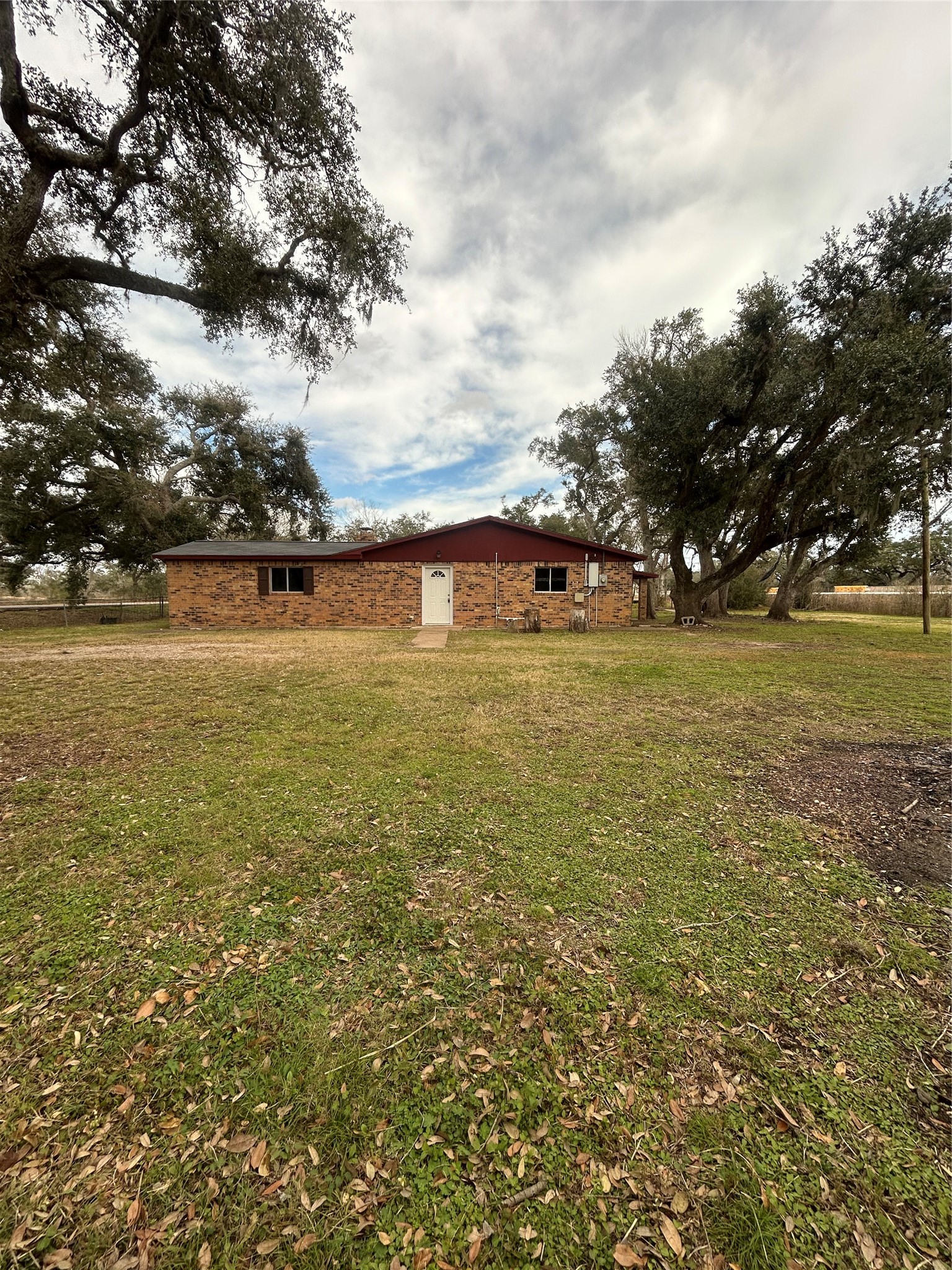 5811 East S F Austin Road Freeport, TX 77541 - Photo 2 of 26 Right side of home