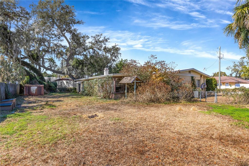 310 Kenmore Road Brandon, FL 33511 - Photo 32 of 33 a view of a yard with a house