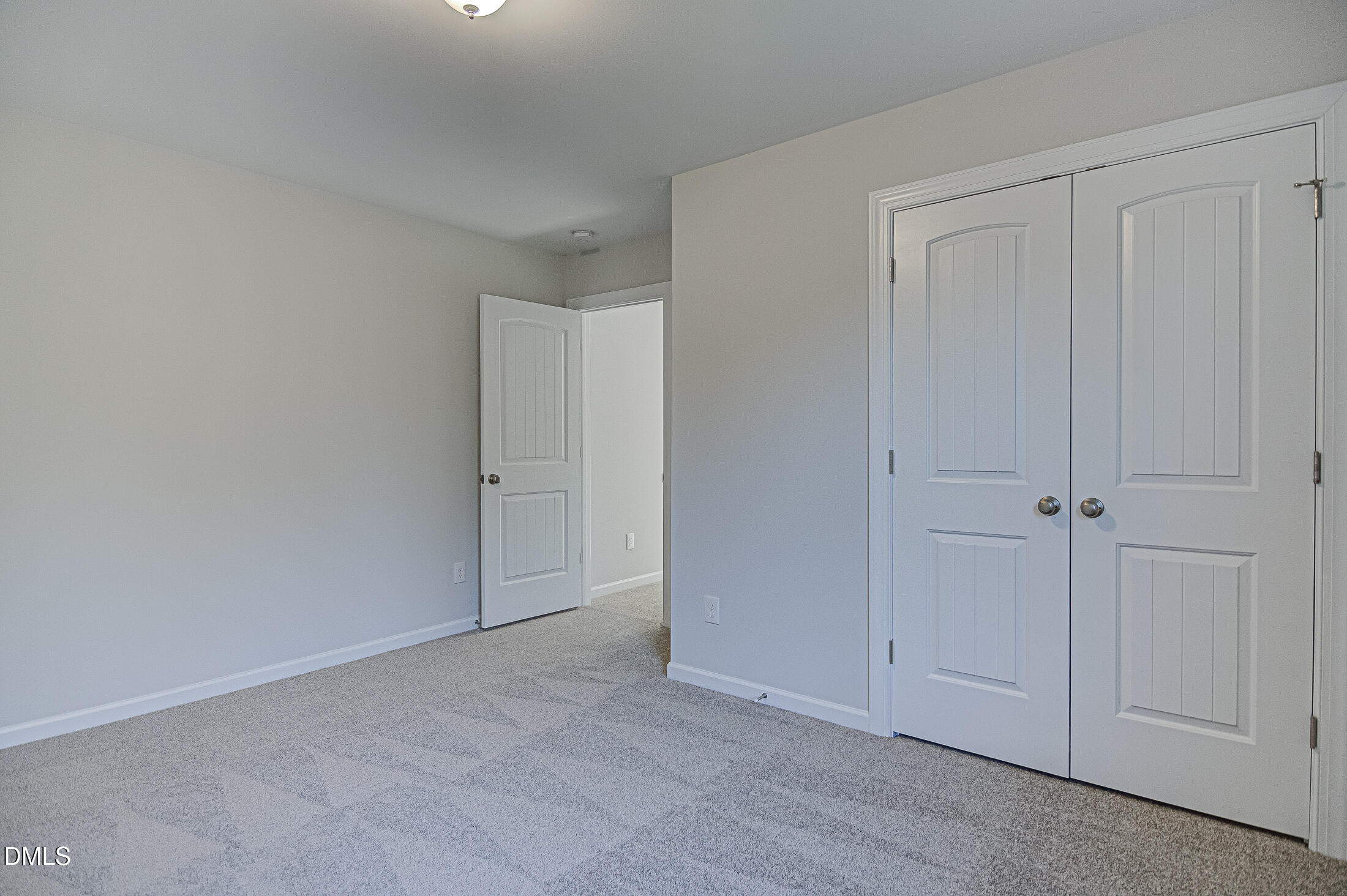 108 Starlet Ridge Way Clayton, NC 27520 - Photo 19 of 33 a view of an empty room and closet area