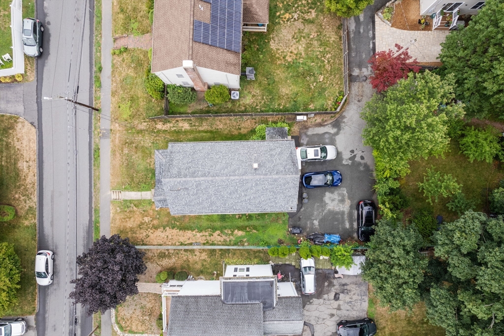 102 Maple Street Needham, MA 02492 - Photo 5 of 7 aerial view of a house with a garden
