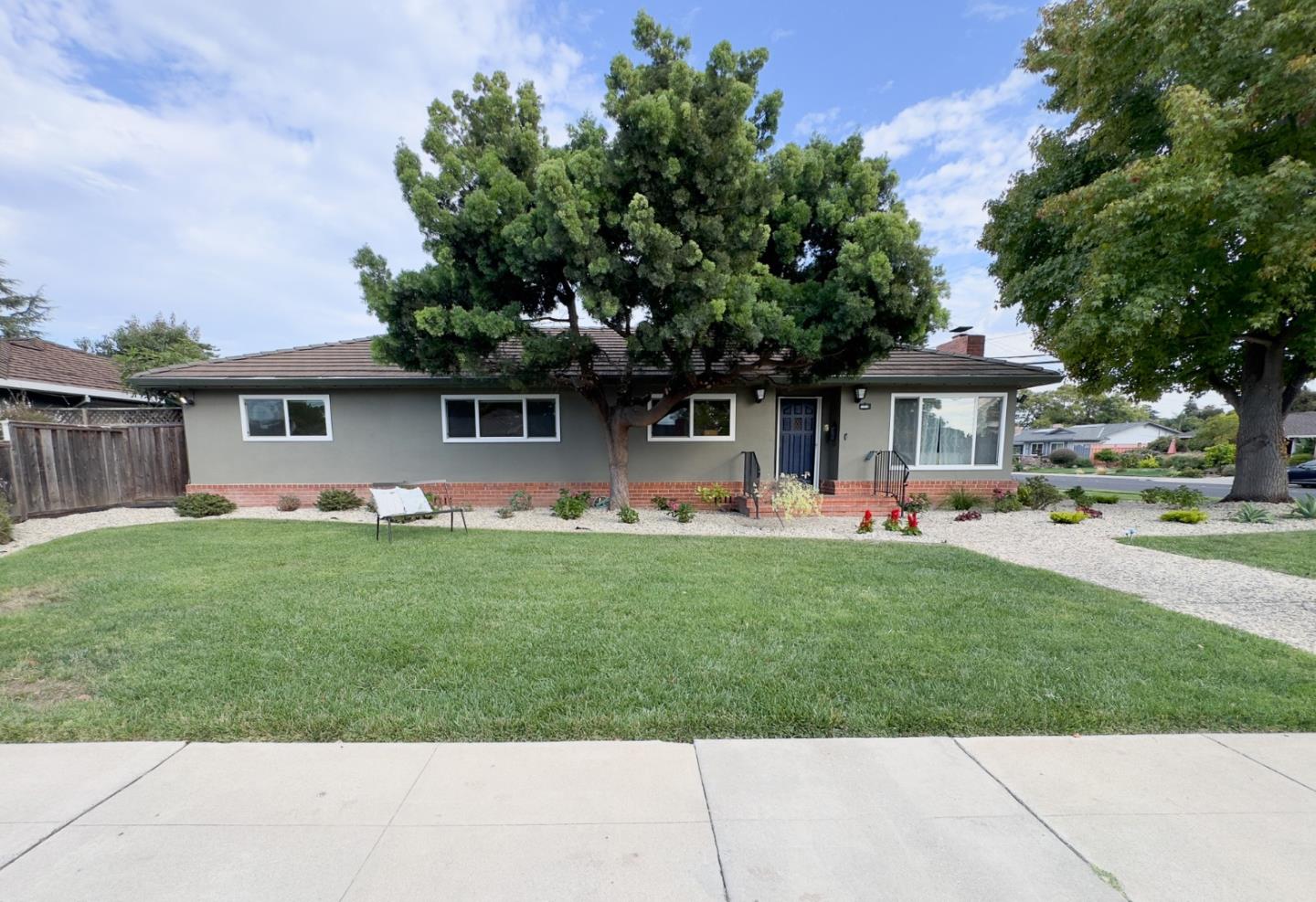 4586 Norris Road Fremont, CA 94536 - Photo 1 of 1 a front view of house with yard and green space