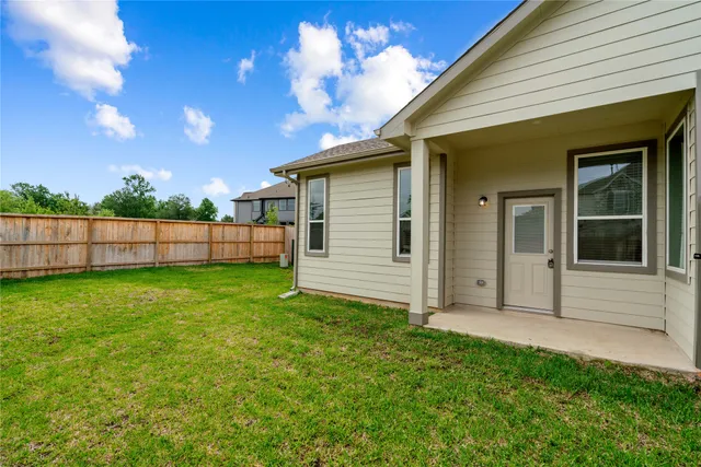 a view of a backyard with a garden