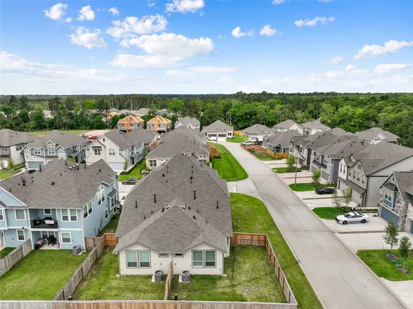 a aerial view of a house with a garden and plants