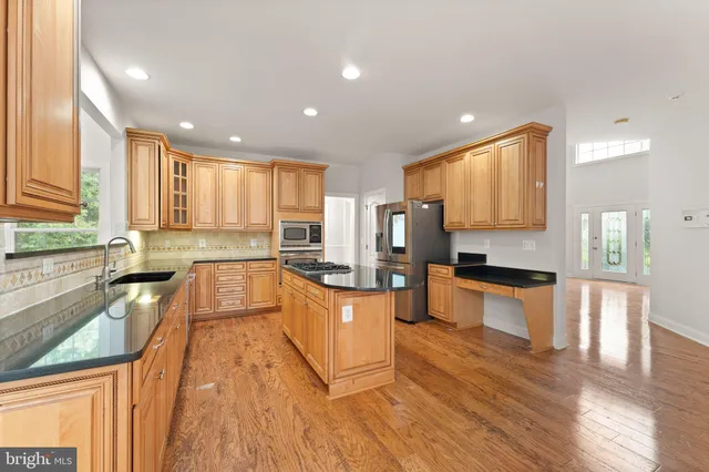 a view of an empty room and a window