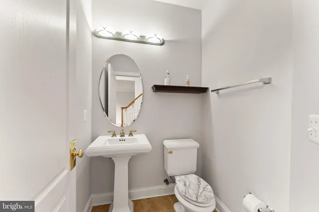 a view of an empty room with stairs and ventilation