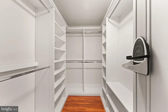 a view of a house with a yard and pathway