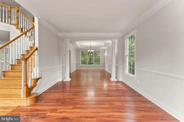 a kitchen with stainless steel appliances granite countertop a stove a sink dishwasher and a refrigerator