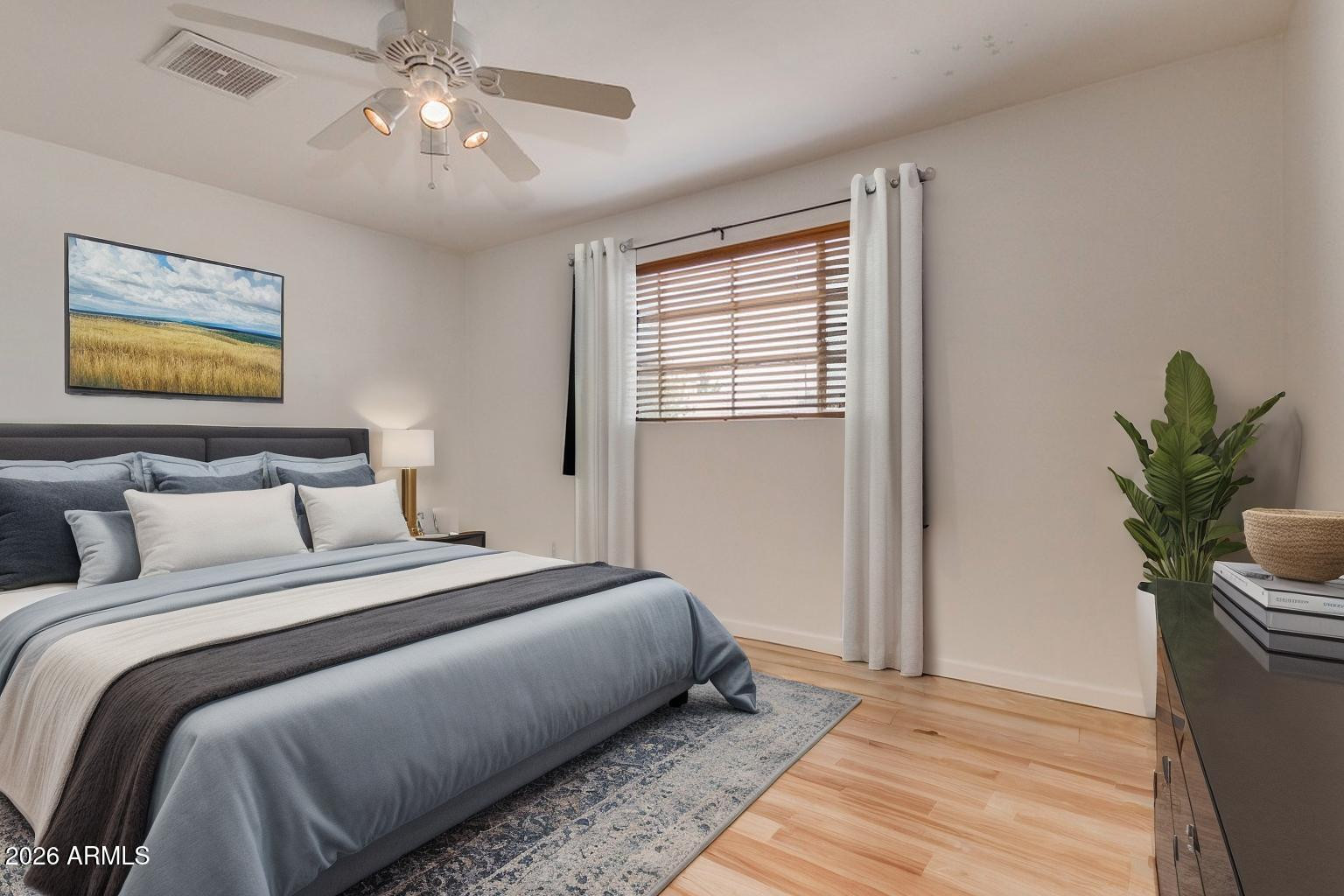 1308 West 6th Street Tempe, AZ 85281 - Photo 19 of 27 a bedroom with bed and a window