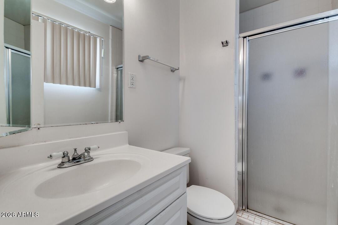 1308 West 6th Street Tempe, AZ 85281 - Photo 21 of 27 a bathroom with a sink toilet and shower
