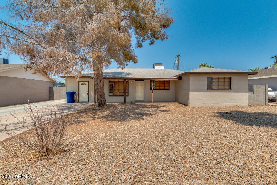 1308 West 6th Street Tempe, AZ 85281 - Photo 6 of 27 a front view of a house with a yard
